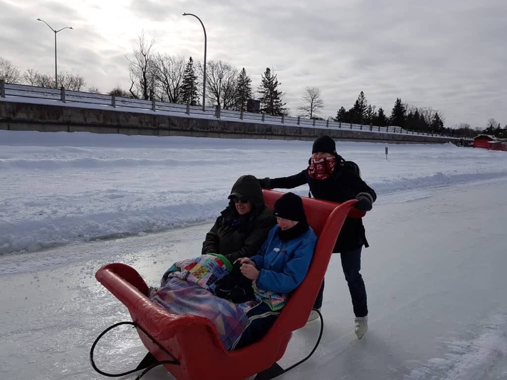 Irene and her parents Ron and Gail on the Rideau Canal