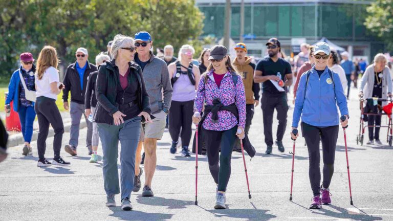 Photo of crowd walking down Thurson Drive during the 2026 Walk for Dementia. Photo by Hamza Bennani